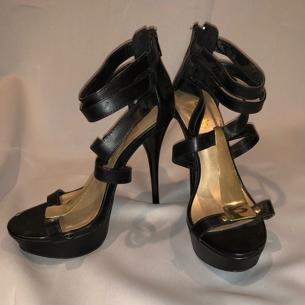 Black and gold heel